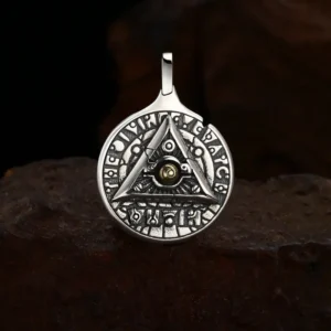 Antique oxidized 925 sterling silver all‑seeing‑eye triangle rune medallion pendant, moody rough rock background occult talisman unisex jewelry
