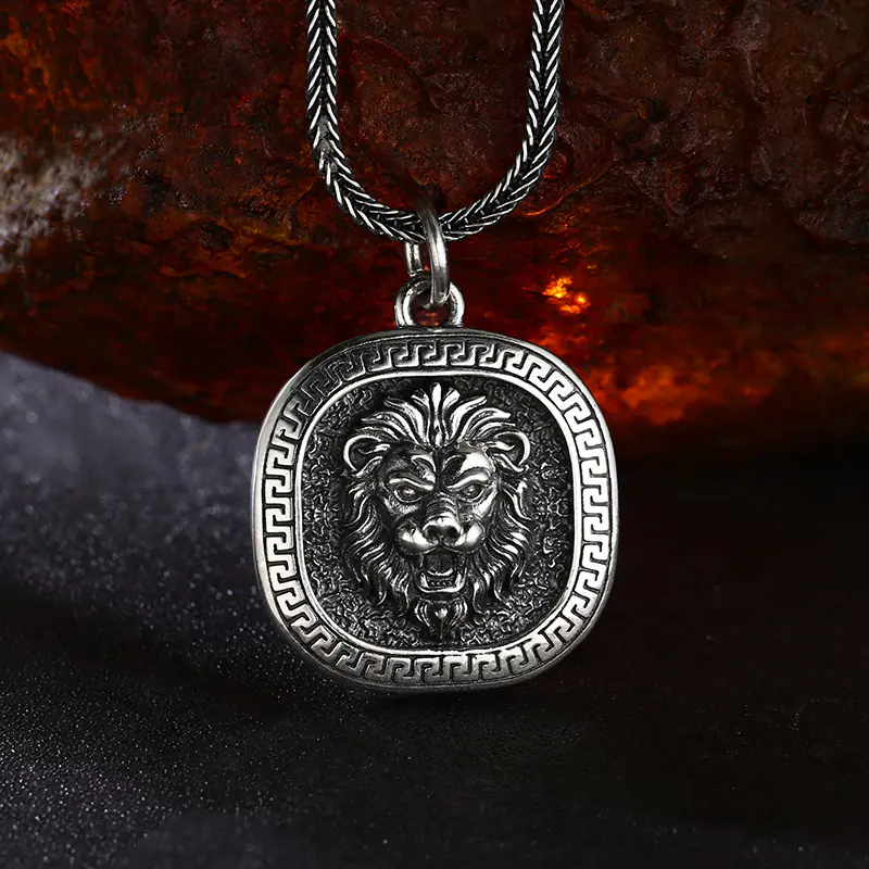 Antique oxidized 925 sterling silver roaring lion head square pendant with greek key border, moody rough rock background men strength talisman necklace charm