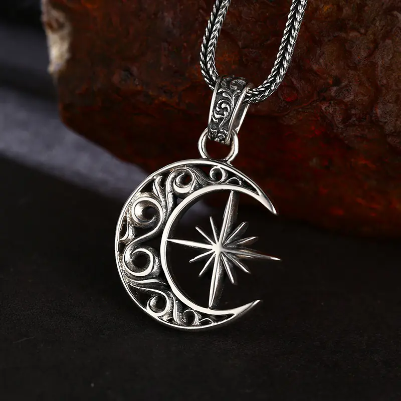 Front close‑up view retro open‑work carved crescent moon north star 925 sterling silver pendant unisex boho goth charm necklace