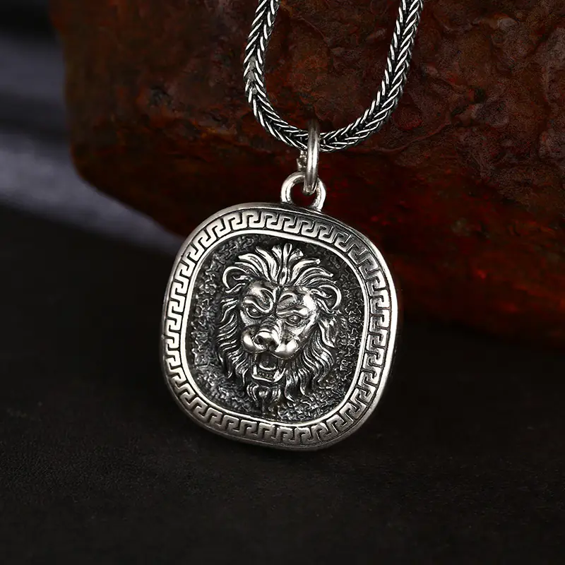 Front close‑up view vintage 925 sterling silver roaring lion head square pendant, embossed greek‑key border masculine talisman charm for men