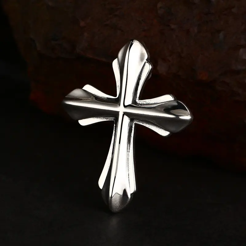 3-heavy‑gothic‑cross‑925‑silver‑pendant‑side‑angle‑sculpted‑profile‑rust‑rock‑shot.jpg Side‑angled view heavy 925 sterling silver gothic cross pendant, highlighting curved sculpted profile and polished silver surface