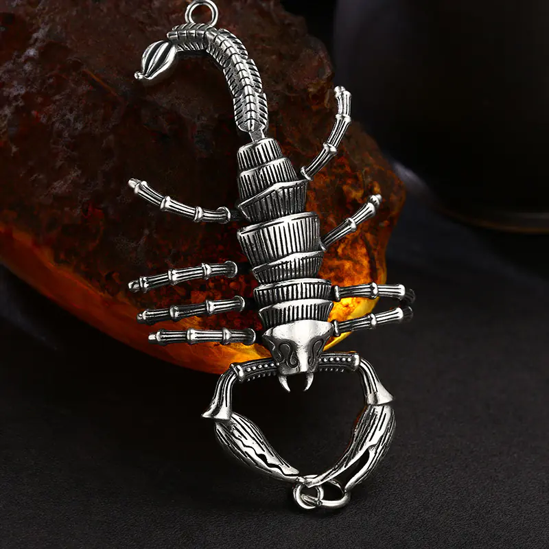 3-retro‑925‑silver‑movable‑scorpion‑pendant‑low‑angle‑relief‑carving‑detail‑shot.jpg Low‑angle detail shot vintage 925 sterling silver movable scorpion pendant, realistic claws segmented tail gothic biker animal jewelry