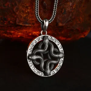 Tilted 3D detail shot 925 sterling silver four intertwined snake open‑work rune pendant, antique oxidized finish showing solid thickness and carving depth