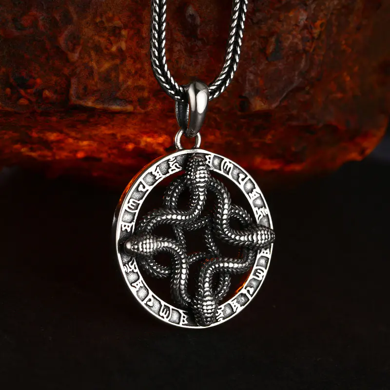 3-retro‑four‑intertwined‑snake‑rune‑925‑silver‑pendant‑tilted‑3d‑oxidized‑detail‑shot.jpg Tilted 3D detail shot 925 sterling silver four intertwined snake open‑work rune pendant, antique oxidized finish showing solid thickness and carving depth