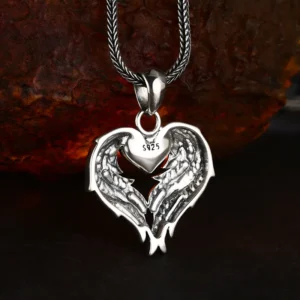 Back close‑up of 925 sterling silver angel wing gold heart pendant, S925 hallmark stamp and reverse feather texture details