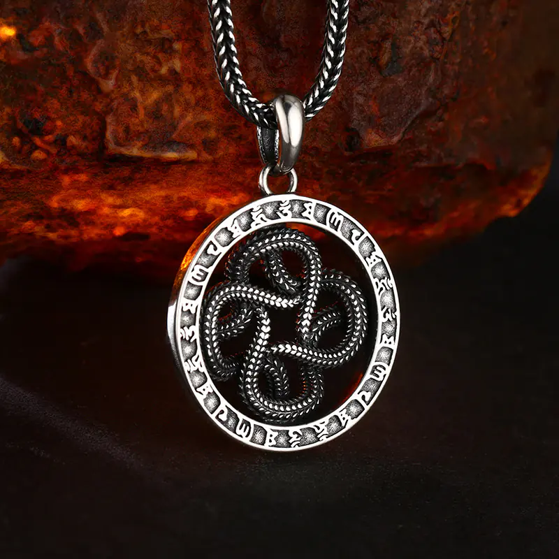 4-925‑silver‑four‑intertwined‑snake‑rune‑pendant‑macro‑back‑openwork‑structure‑detail.jpg Macro close‑up back view of 925 silver four intertwined snake rune pendant, fine open‑work carving and mystic rune rim vintage occult jewelry