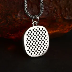 Macro close‑up back view of 925 silver lion head square pendant, fine grid textured back surface vintage masculine silver jewelry