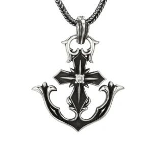Hero product shot vintage oxidized 925 sterling silver anchor cross pendant with inlaid stone, isolated on pure white background with wheat chain
